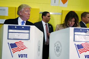 Republican presidential nominee Donald Trump and his wife Melania Trump vote at PS 59 in New York, New York, U.S. November 8, 2016. REUTERS/Carlo Allegri TPX IMAGES OF THE DAY - RTX2SKKG